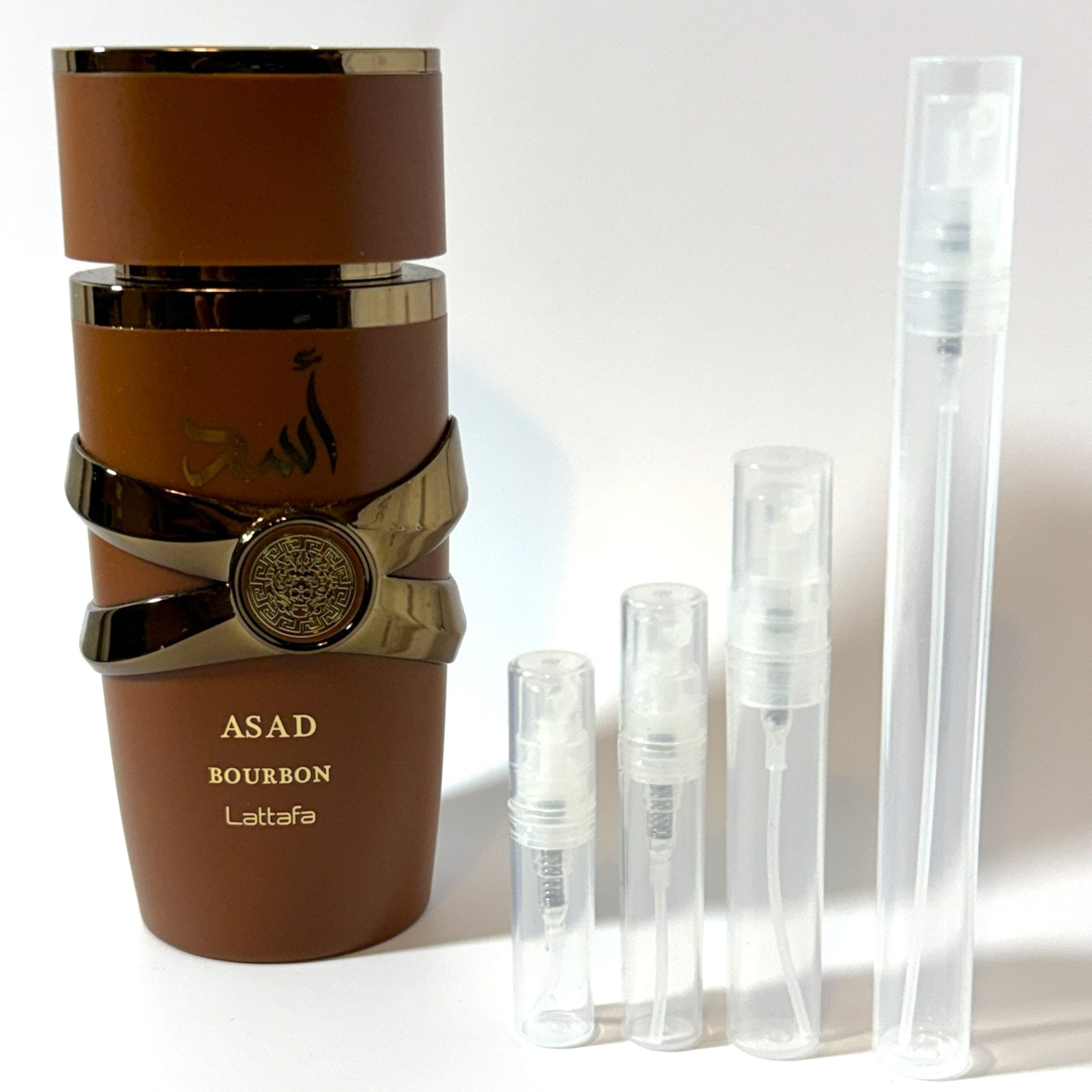 Lattafa Asad Bourbon bottle with Decant Direct sample spray